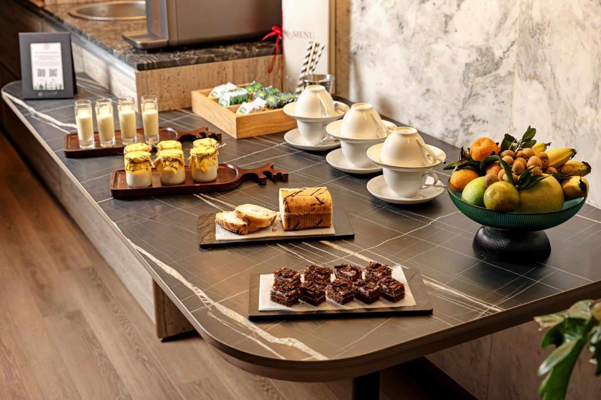 La Siesta Classic Hang Thung Hanoi Exterior photo A buffet with a selection of desserts